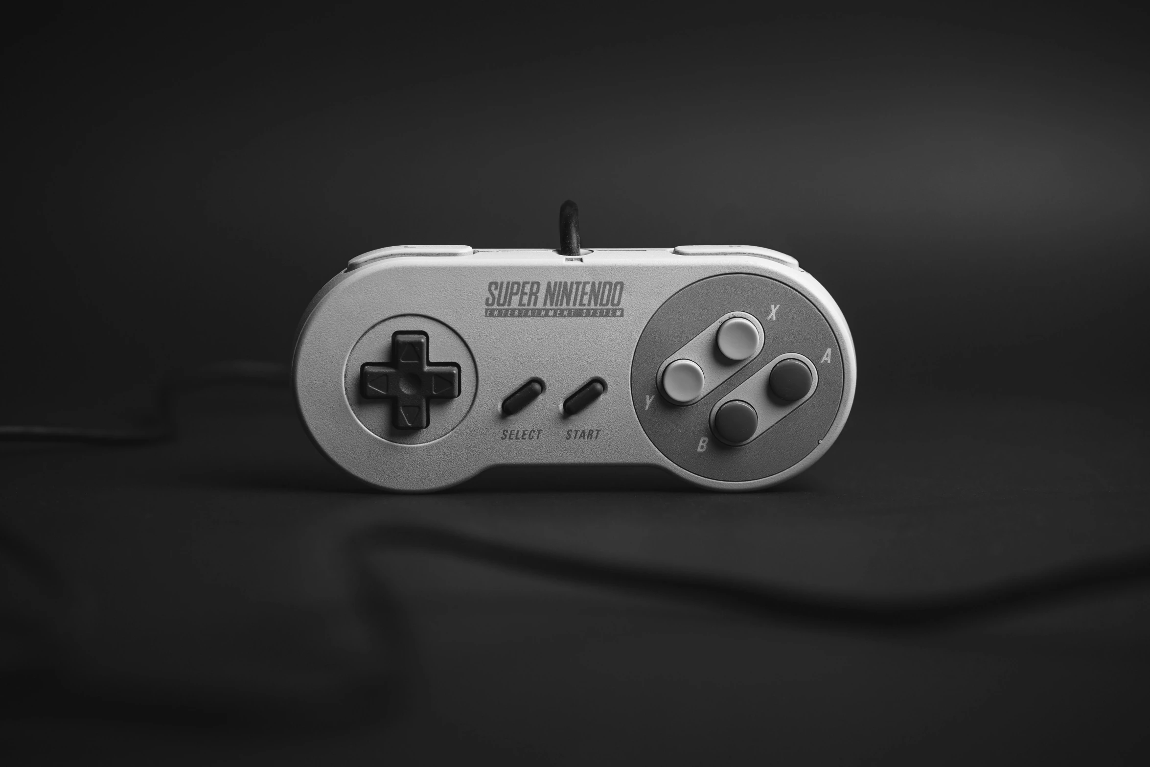 a video game controller sitting on top of a table, an ambient occlusion render, by Jan Kupecký, unsplash, computer art, super nintendo game sprite, grey metal body, game cover, super smash bros