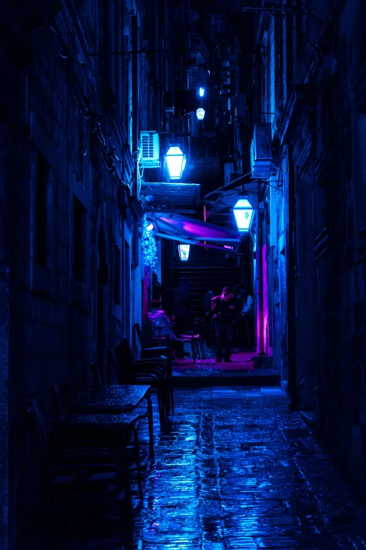 a dark alley with a bench and street lights, an album cover, unsplash contest winner, dubrovnik, stern blue neon atmosphere, street lanterns, blue and violet