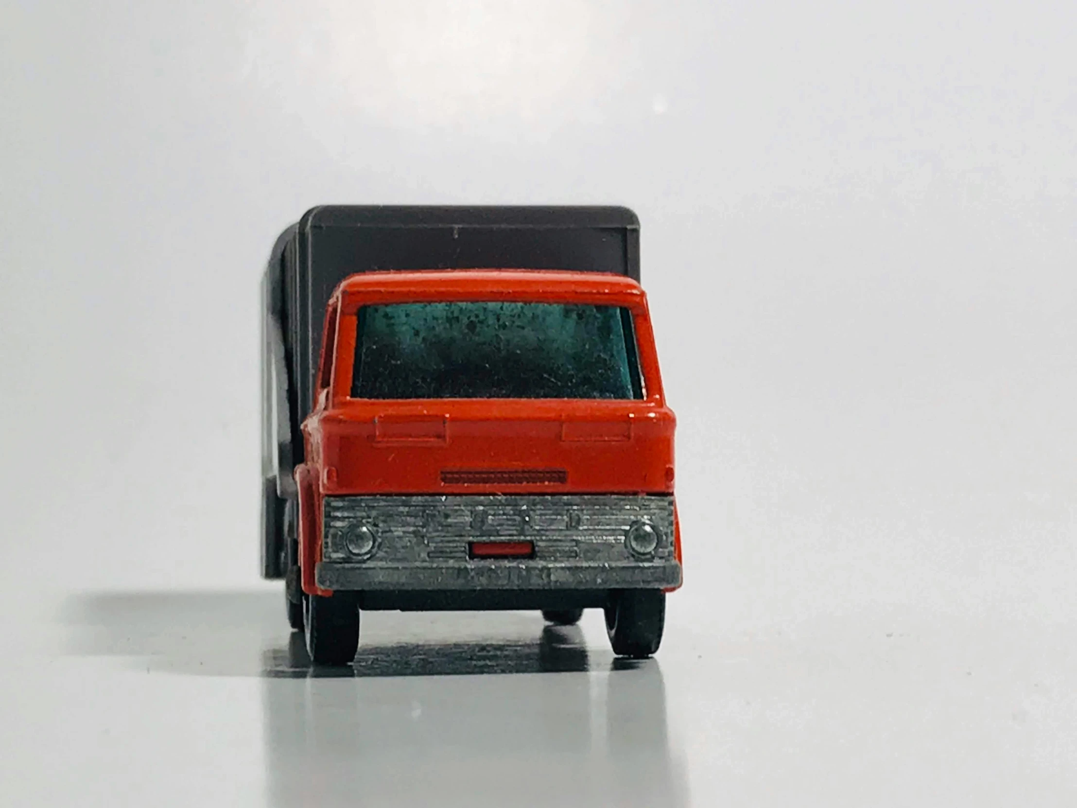 a close up of a toy truck on a white surface, unsplash, photorealism, ffffound, microbus, hotwheels, ford