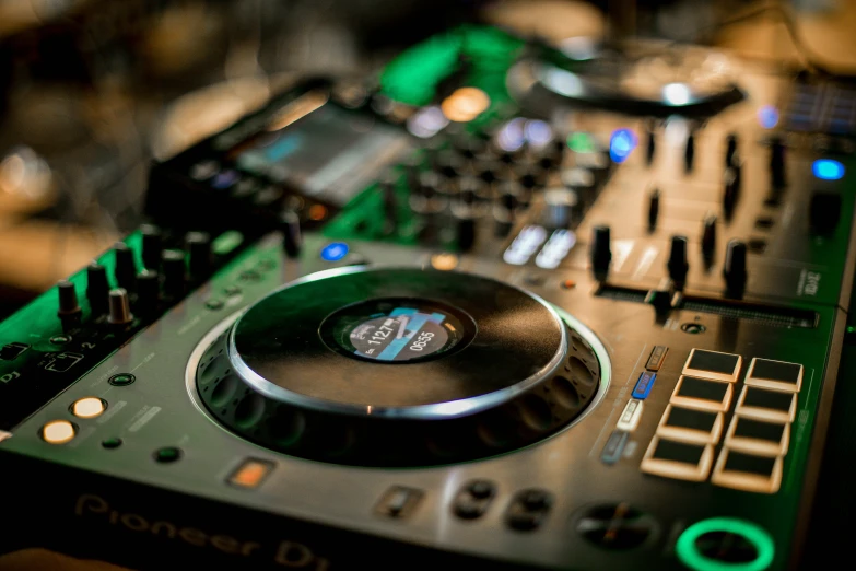 a dj controller sitting on top of a table, multiple stories, thumbnail, a green, club photography