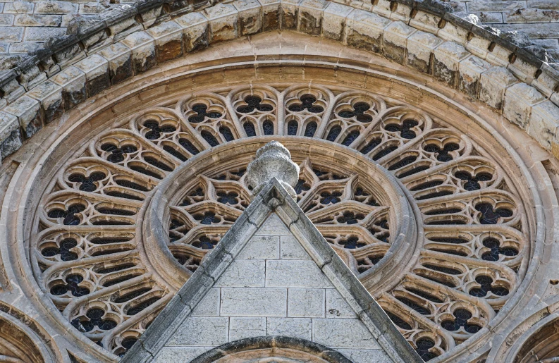 a close up of a building with a clock on it, an album cover, inspired by Taddeo Gaddi, pexels contest winner, romanesque, mystical cathedral windows, ornamental halo, grey, brown