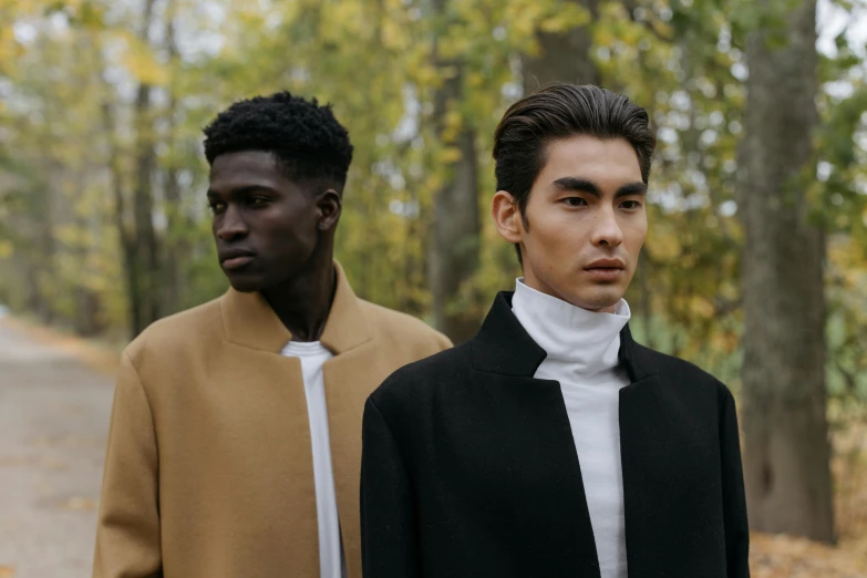 a couple of men standing next to each other, trending on pexels, renaissance, high fashion modeling, ethnicity : japanese, black and brown, fall