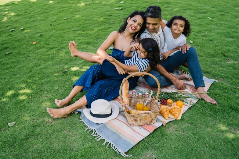 a family having a picnic in the park, a portrait, pexels contest winner, square, full body image, hispanic, 1 5 9 5