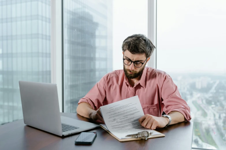 a man sitting at a table with a laptop and papers, a cartoon, pexels contest winner, selling insurance, lachlan bailey, holding notebook, low fi