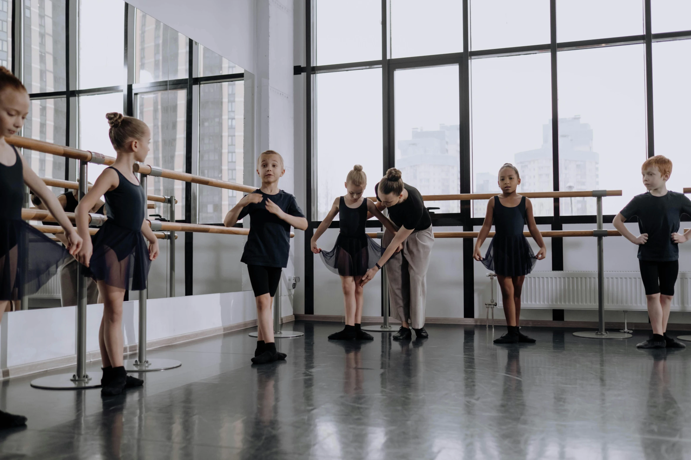 a group of children standing next to each other in a dance studio, pexels contest winner, arabesque, thumbnail, australia, [ cinematic, blank