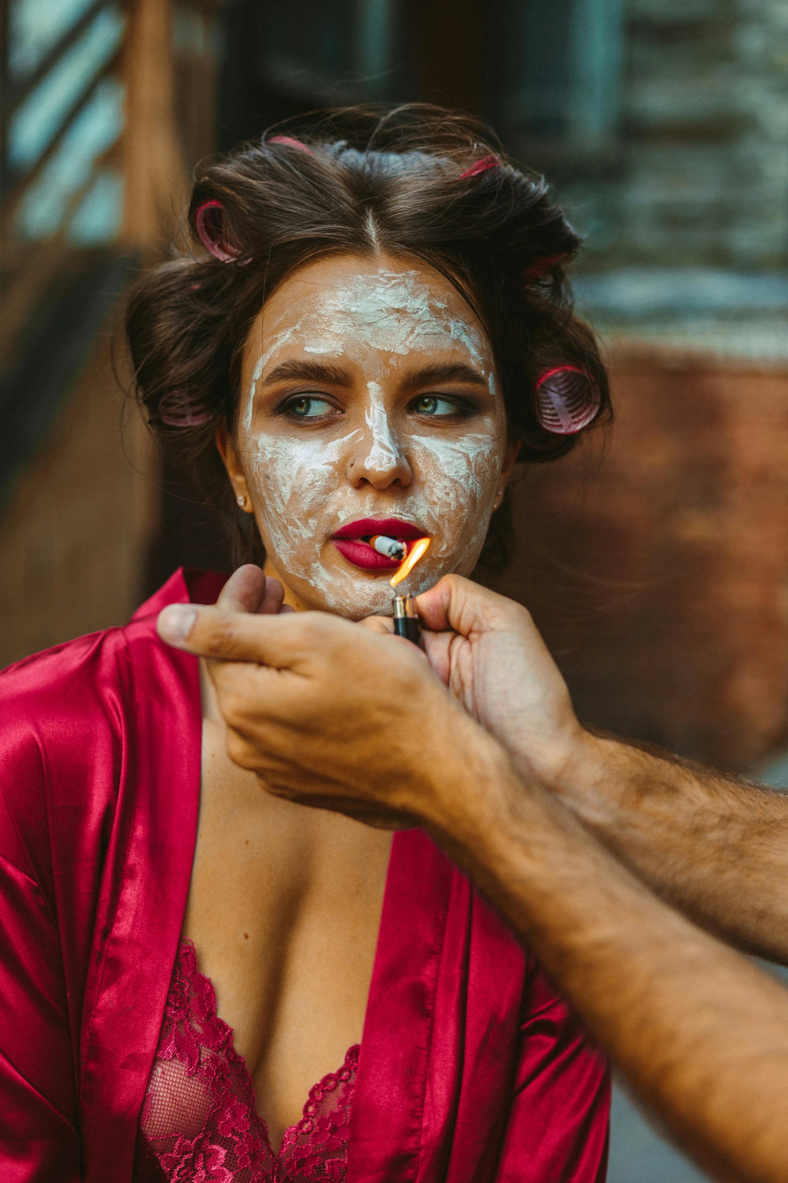 a man putting makeup on a woman's face, inspired by Hedi Xandt, trending on pexels, renaissance, smoking body, brunette, red face, full shot