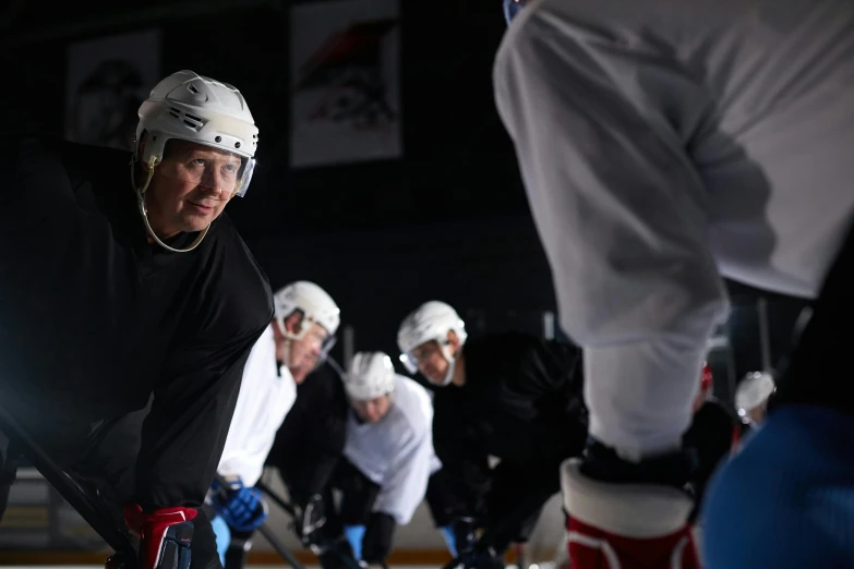 a group of young men playing a game of ice hockey, a portrait, reddit, photorealism, behind the scenes photo, 8k octan advertising photo, panoramic shot, taken with sony alpha 9