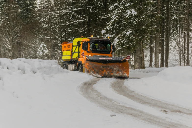 a snow plow driving down a snow covered road, by Haukur Halldórsson, hurufiyya, avatar image
