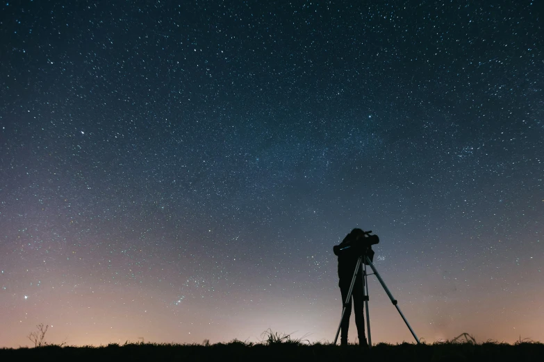 a person taking a picture of the night sky, by Niko Henrichon, tripod, scientific photography, photography], instagram post