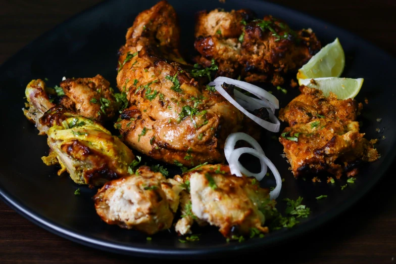 a close up of a plate of food on a table, pexels contest winner, hurufiyya, grilled chicken, indian, wings spread, background image