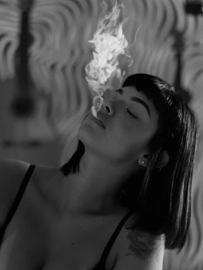 a black and white photo of a woman smoking a cigarette, a black and white photo, inspired by Elsa Bleda, pexels contest winner, surrealism, blunt bangs fall on her forehead, ganja, fireball lighting her face, still from a music video