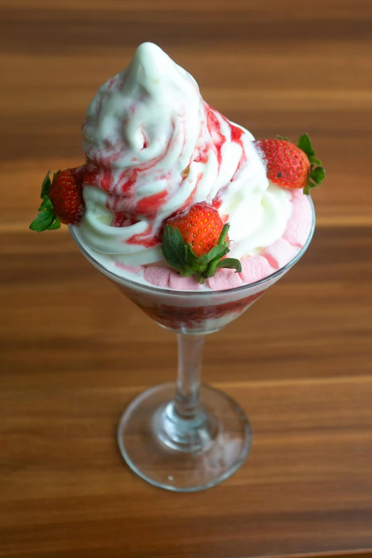 a close up of a dessert in a glass on a table, strawberry ice cream, 🍸🍋, whipped cream on top, small