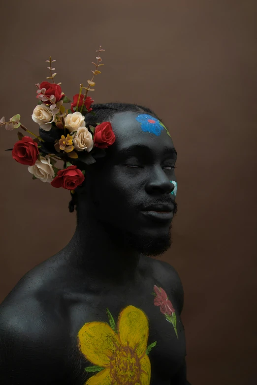 a man with a flower crown on his head, by artist, pexels contest winner, black arts movement, photo of a model, painted black, mapplethorpe, body portrait