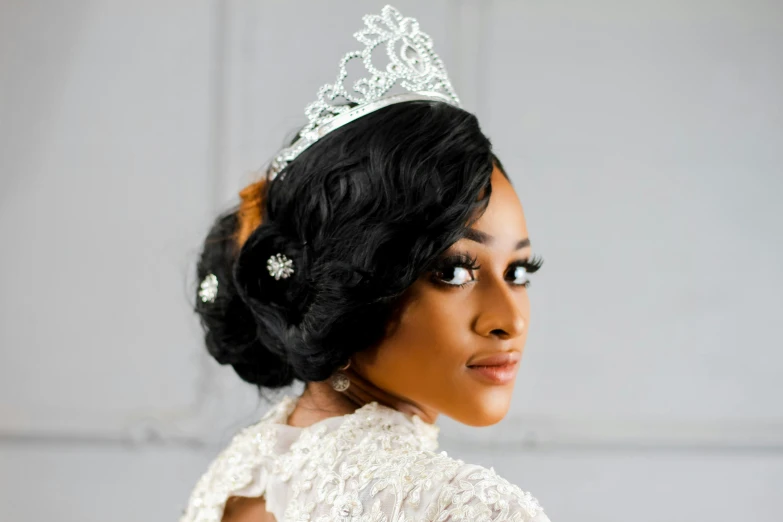 a woman wearing a tiara and a wedding dress, by Chinwe Chukwuogo-Roy, happening, close-up shoot, various posed, portrait n - 9, silver crown