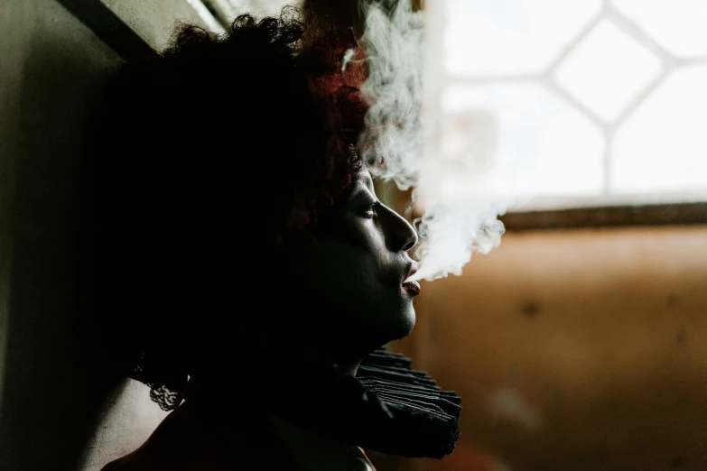 a woman smoking a cigarette in front of a window, pexels contest winner, afrofuturism, black man with afro hair, profile image, smoke under the ceiling, from below