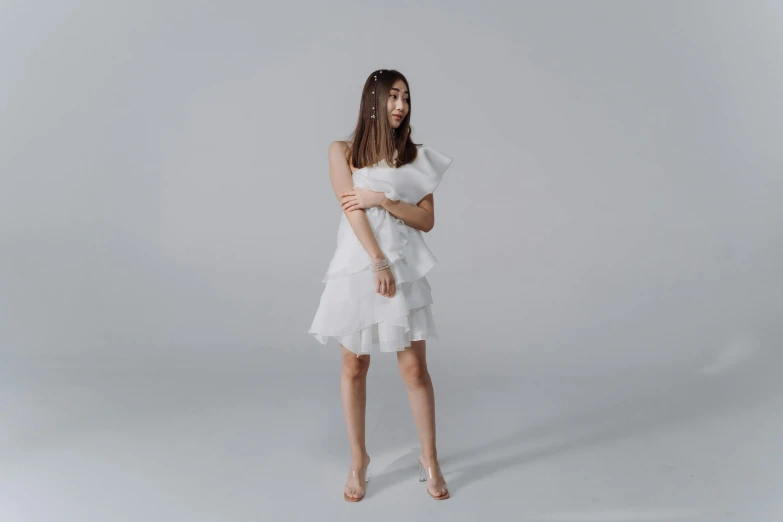 a woman in a white dress posing for a picture, product shot, frill, nico wearing a white dress, in a medium full shot