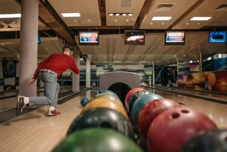 a man playing a game of bowling in a bowling alley, inspired by Joseph Bowler, pexels contest winner, 15081959 21121991 01012000 4k, daniil kudriavtsev, thumbnail, sportspalast amphitheatre