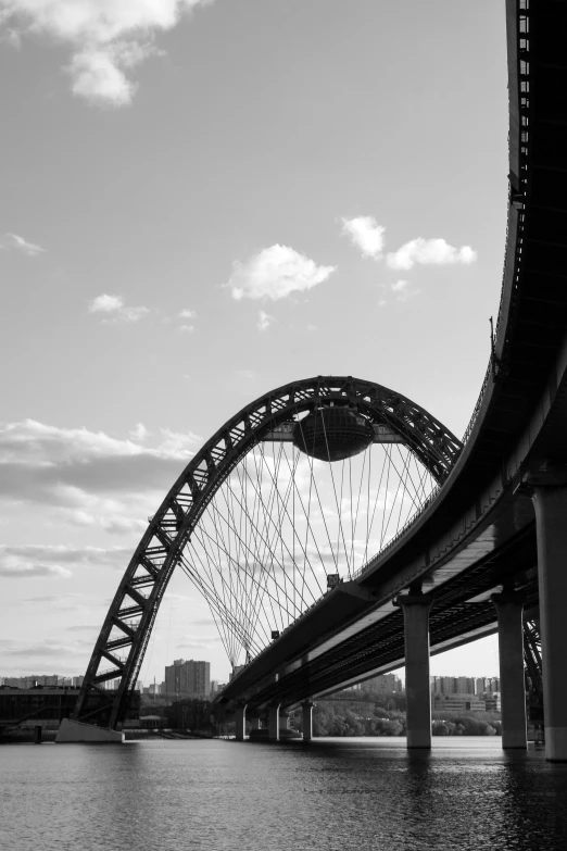 black and white photograph of the tyne bridge in tyne tyne tyne tyne tyne tyne tyne tyne tyne tyne tyne tyne tyne tyne tyne tyne tyne tyne tyne, a black and white photo, inspired by Alexander Stirling Calder, surrealism, ornamental halo, july 2 0 1 1, in moscow centre, monorail