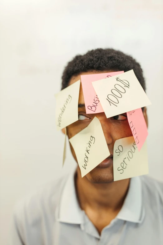 a man with post it notes on his face, pexels, ashteroth, with labels and notes, stressed, digital still