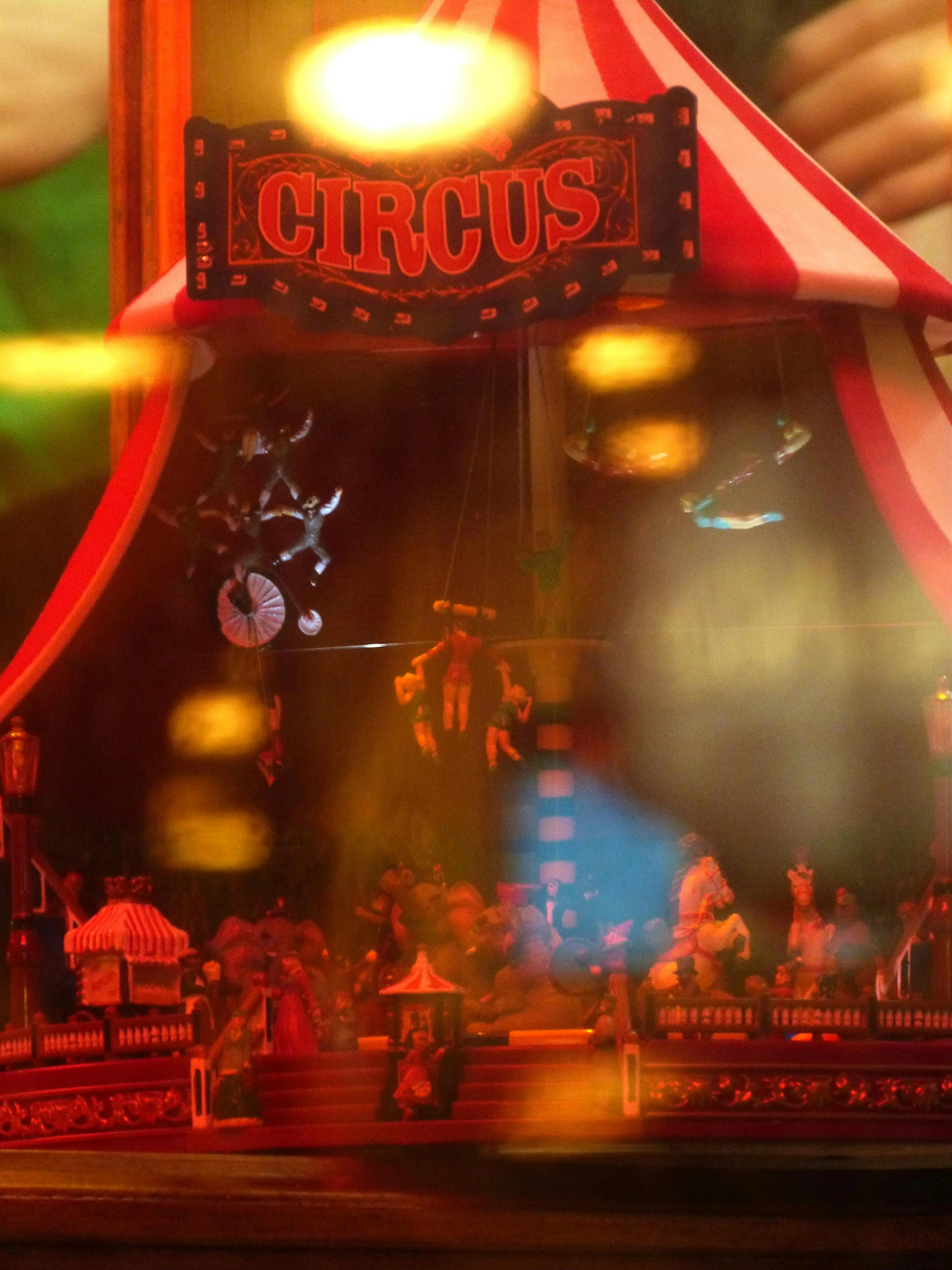 a red and white circus tent sitting on top of a table