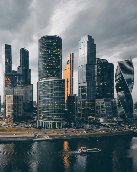 a large body of water surrounded by tall buildings, by Alexey Venetsianov, pexels contest winner, socialist realism, three towers, gif, russian architecture, large commercial led screens