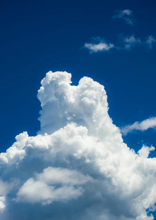 a large cloud in the middle of a blue sky, by Jan Rustem, unsplash, profile image, giant cumulonimbus cloud, hoog detail, high-angle