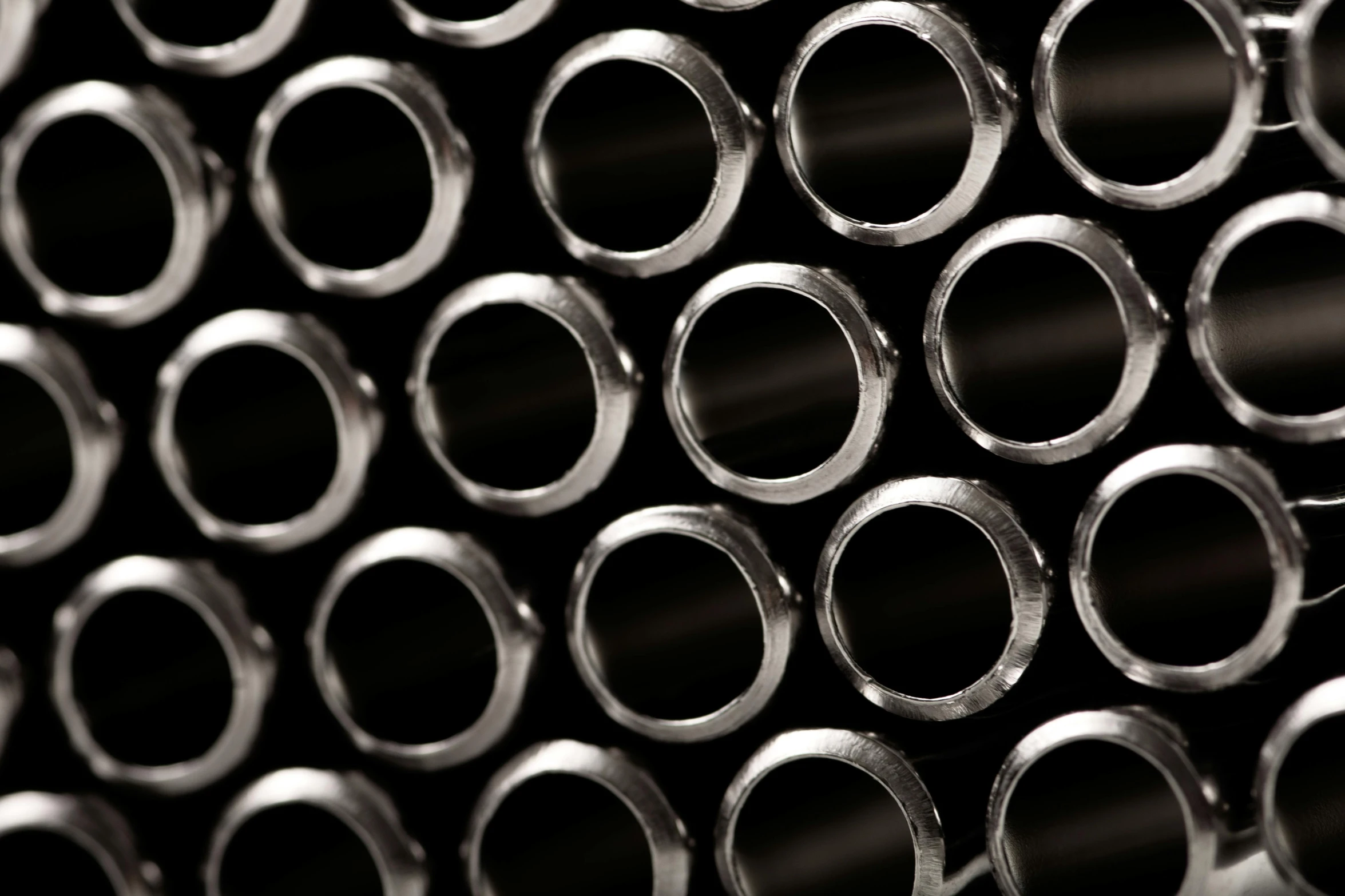 a bunch of metal pipes stacked on top of each other, a picture, by Thomas Häfner, unsplash, seamless micro detail, commercial product photography, liquid polished metal, high contrast hyperrealism 8k