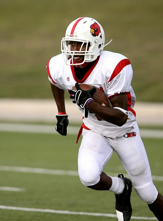 a man running with a football on a field, by Terrell James, happening, tournament, profile pic, high quality image, ap press photo