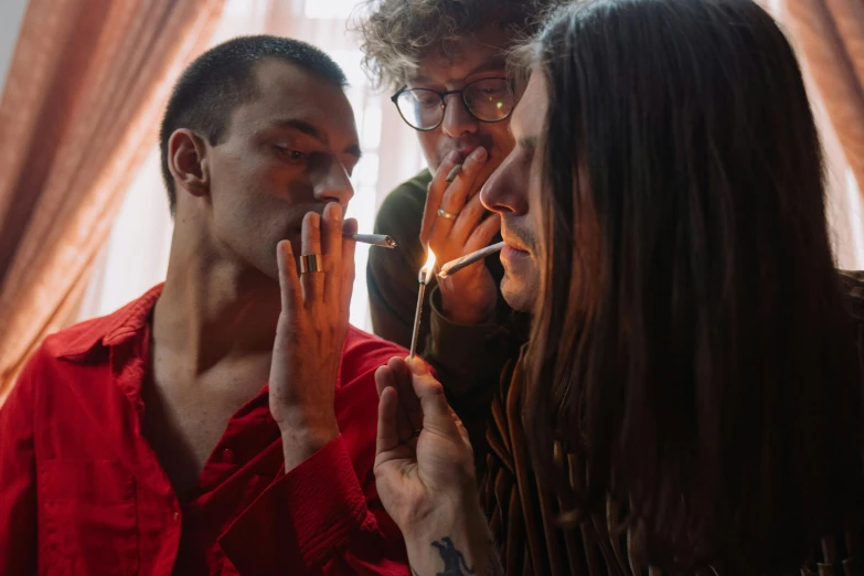 a group of people standing next to each other, inspired by Elsa Bleda, antipodeans, smoking a joint, profile image, incense, center of picture