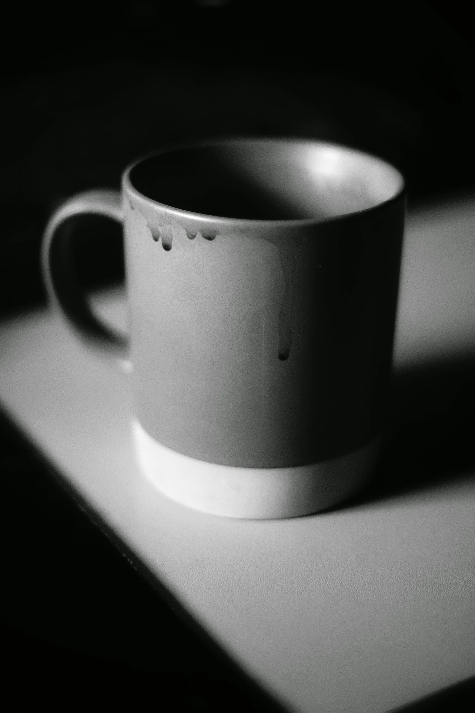 a black and white photo of a coffee cup, by Andrew Domachowski, wet clay, square, uploaded, :: morning