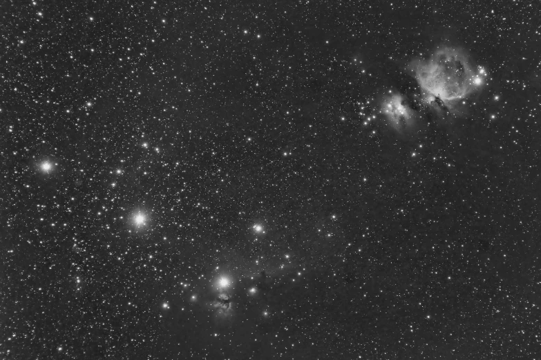 a black and white photo of a cluster of stars, a black and white photo, hurufiyya, trio, hastur, reading, mane