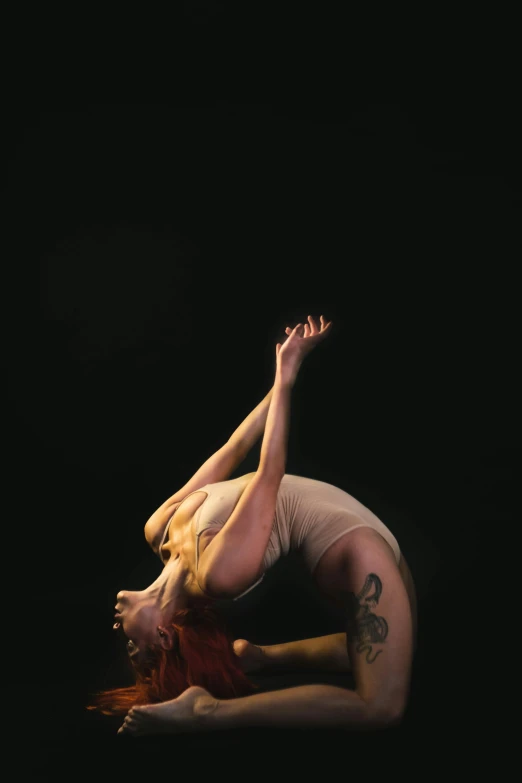 a woman in a leo leo leo leo leo leo leo leo leo leo leo leo leo leo, unsplash, conceptual art, acrobatic pose, tattooed, padmasana, concert photo