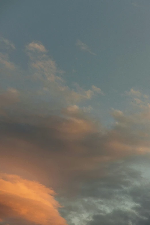 a large jetliner flying through a cloudy sky, a picture, inspired by Frederic Church, unsplash, romanticism, sunset + hdri, zoomed out shot, late summer evening, beautiful new mexico sunset