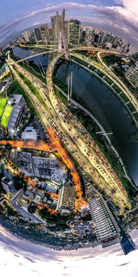 an aerial view of a city at night, by Adam Marczyński, heavy traffic, 8 k detailed photograph, instagram post, highly detailed hdr