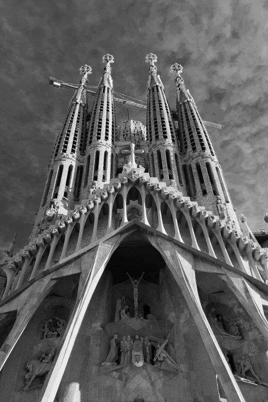 a black and white photo of a very tall building, by Gaudi, cathedral!!!!!, taken in the late 2010s, front view dramatic, trinity