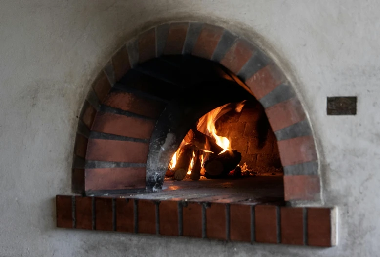 a brick oven with a fire inside of it, vanilla, mid morning lighting, thumbnail, round-cropped