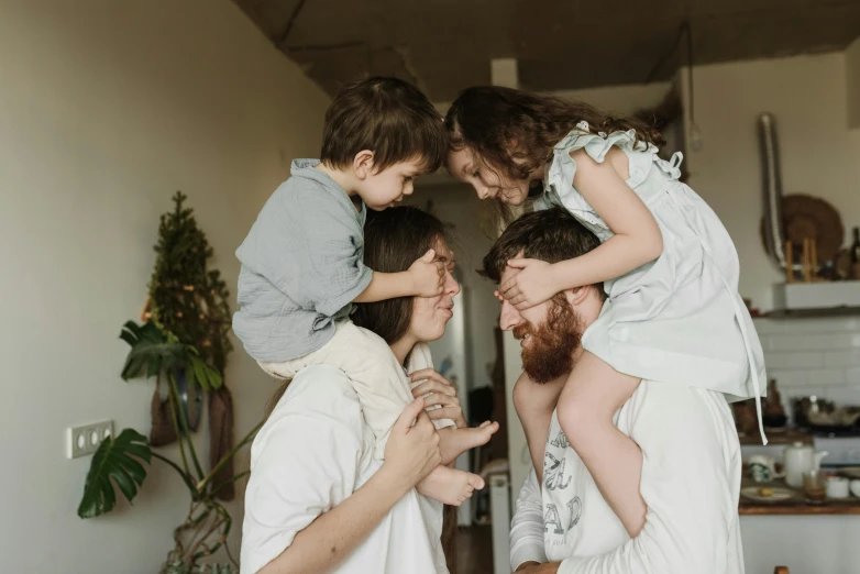 a family poses for a picture in the kitchen, by Emma Andijewska, pexels contest winner, looking upward, bedhead, hipster dad, 15081959 21121991 01012000 4k