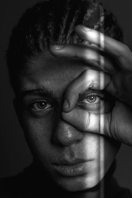 a black and white photo of a man with his hands on his face, a black and white photo, by Adam Marczyński, pexels contest winner, hyperrealism, aida muluneh, slit pupils, close up portrait of woman, boy with neutral face