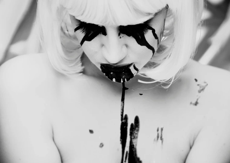 a black and white photo of a woman with paint on her face, inspired by Gottfried Helnwein, transgressive art, eating cakes, face down, girl with white hair, drip