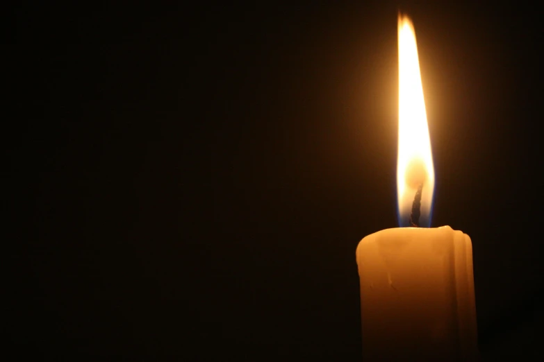 a single lit candle in the dark, by John Murdoch, remembering his life, profile picture, may 1 0, journalism photo