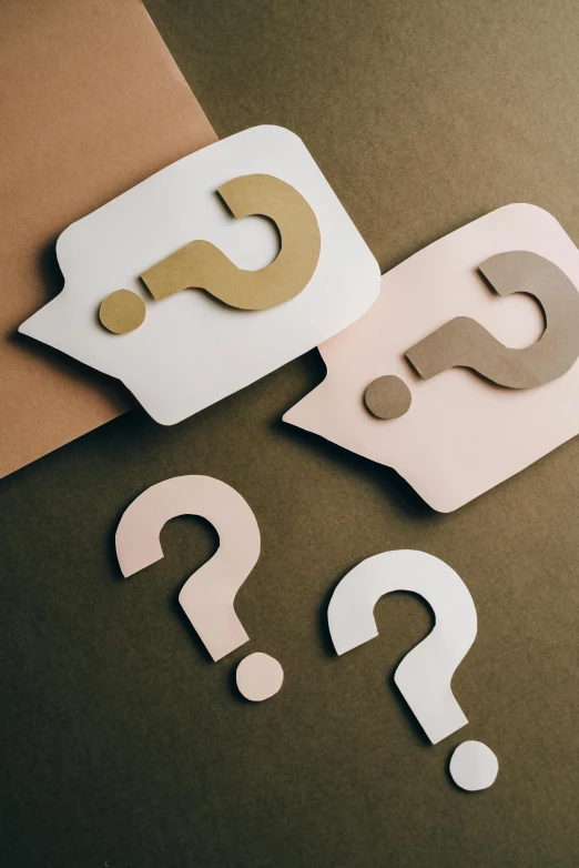 question mark, question mark, question mark, question mark, question mark, question mark mark, question mark mark, question mark mark mark mark, a cartoon, by Daniel Seghers, trending on unsplash, paper cutouts of plain colors, thumbnail, brown ) ), gold and silver shapes