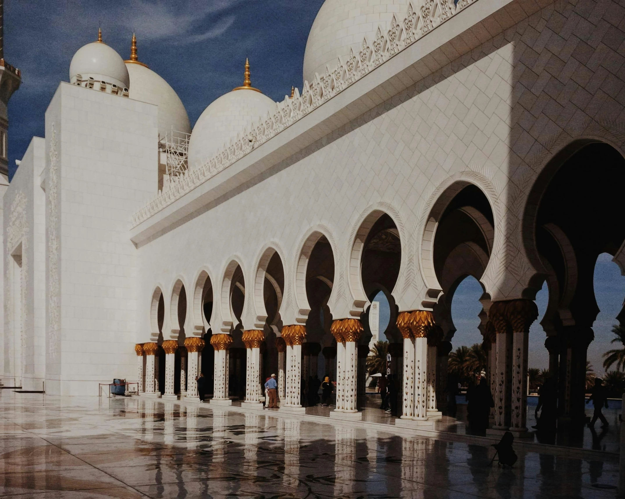 a large white building with arches and pillars, pexels contest winner, hyperrealism, islamic, 1990s photograph, domes, immaculate shading