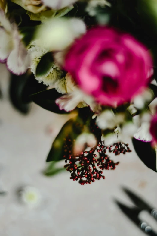 a bouquet of flowers sitting on top of a table, inspired by Louis Buvelot, unsplash, renaissance, detail shot, ornamental, holiday, small details