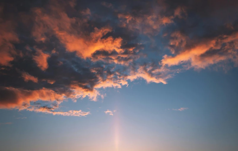 the sun is setting over a body of water, by Jan Rustem, unsplash contest winner, minimalism, rainbow clouds, lights beam, ceremonial clouds, major arcana sky