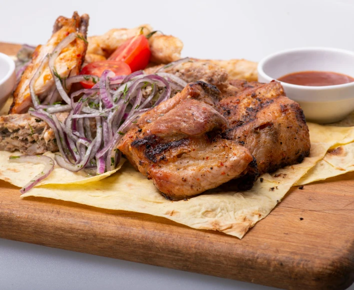 a wooden cutting board topped with meat and vegetables, by Ella Guru, greek ameera al taweel, seaview, manly, great wings