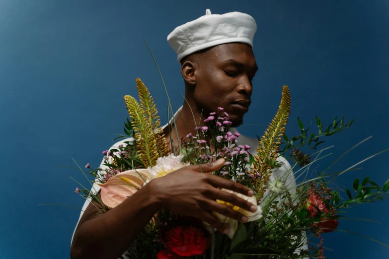 a man in a white hat holding a bouquet of flowers, an album cover, inspired by Barthélemy Menn, pexels contest winner, diverse, loving embrace, promotional photo, ad image