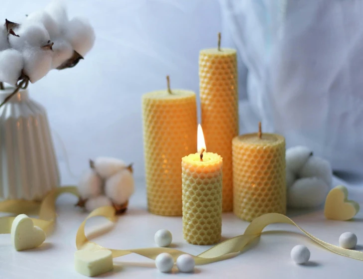 a bunch of candles sitting on top of a table, honeycomb, detailed product shot, large and tall, 1/320