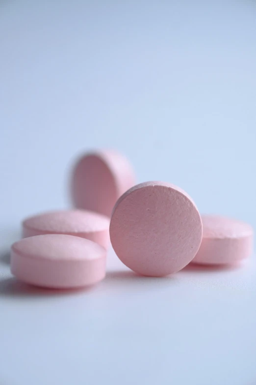 pink pills on a white surface, pexels, antipodeans, marshmallow, ilustration, john pawson, moonlight