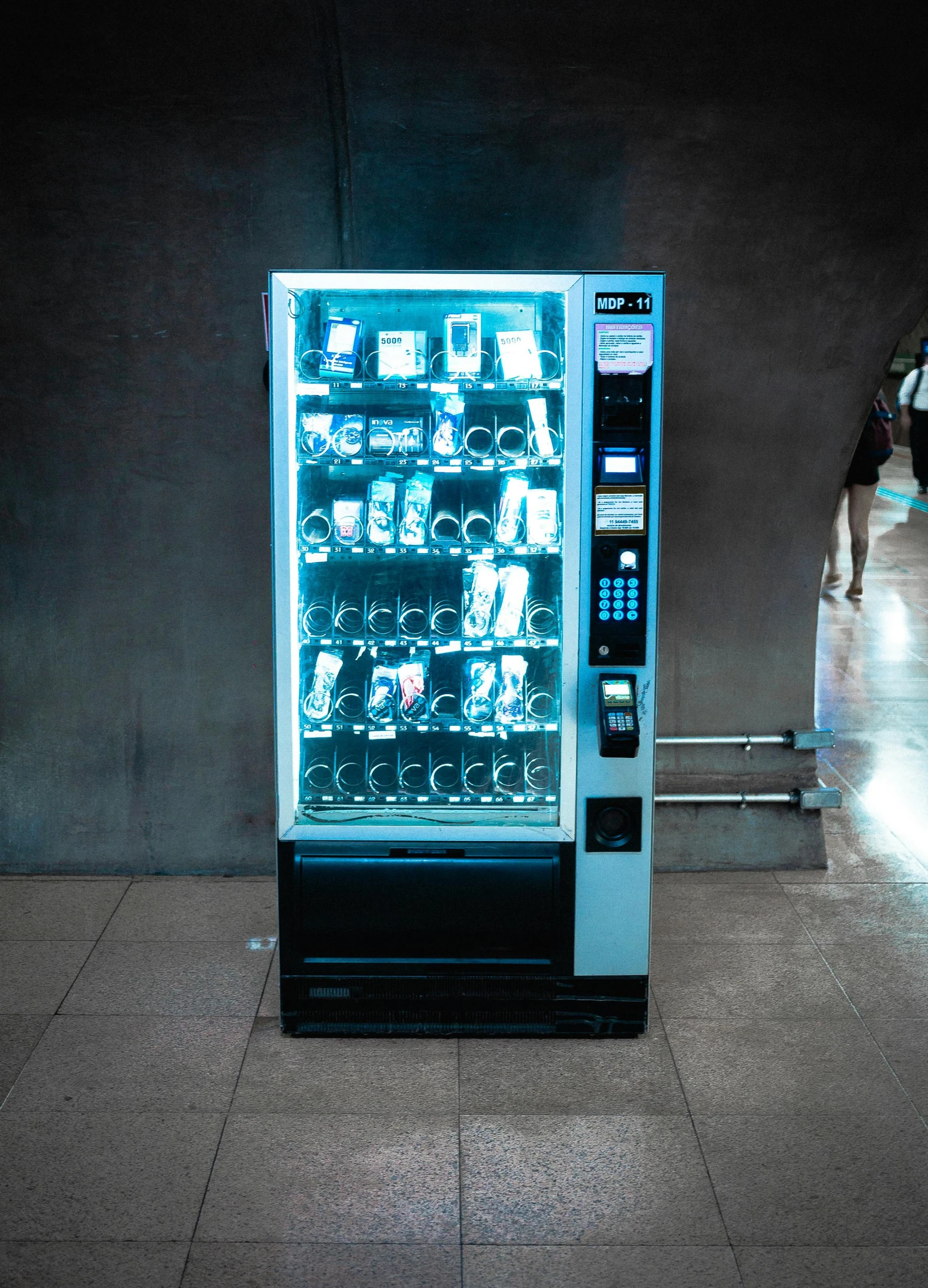 a vending machine in a subway station, inspired by Elsa Bleda, square, dark. no text, 2 7 0 0 k, cyberpunk photo