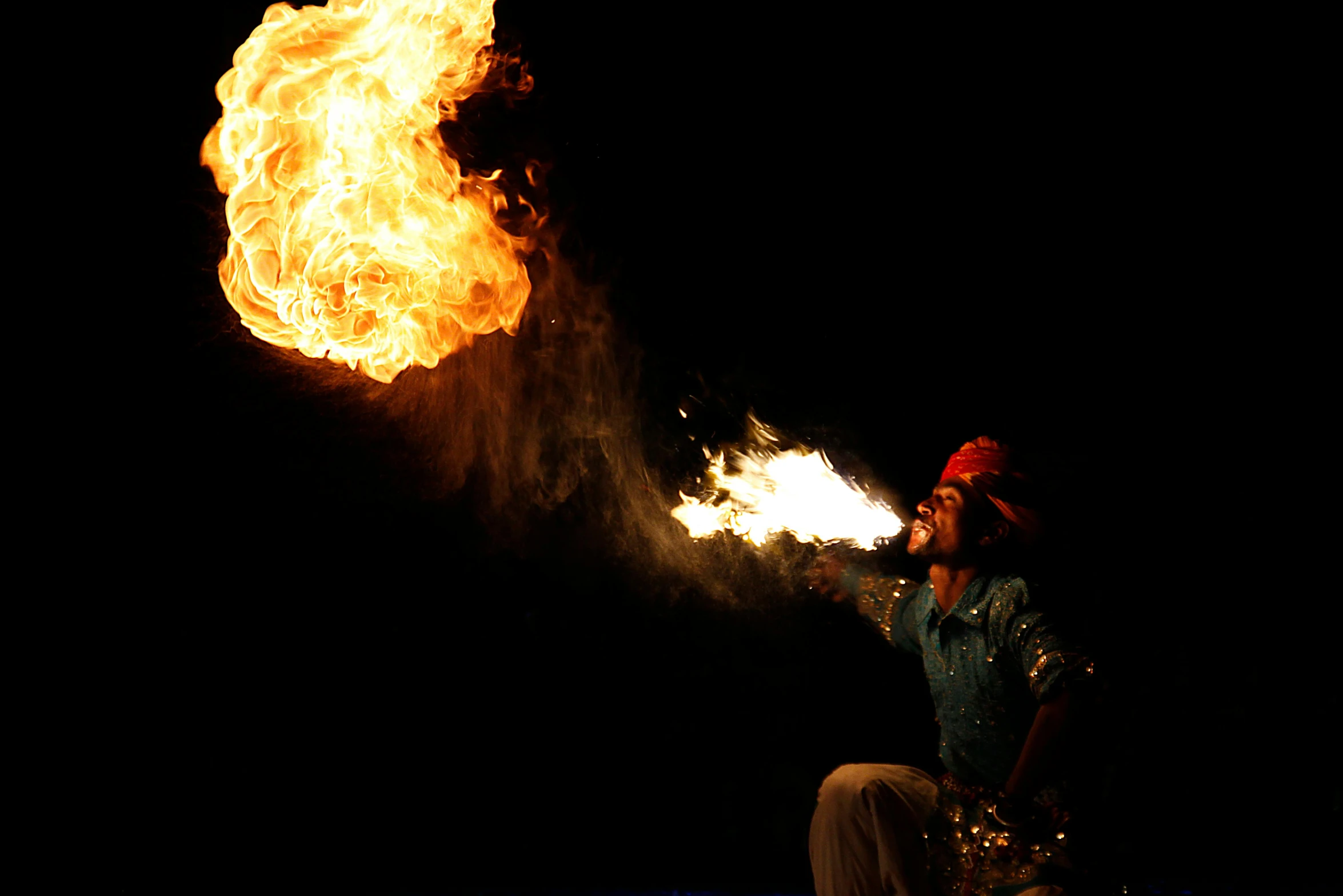 a man that is standing in front of a fire, pexels contest winner, hurufiyya, fire breathing. bowser, performing on stage, avatar image, reuters